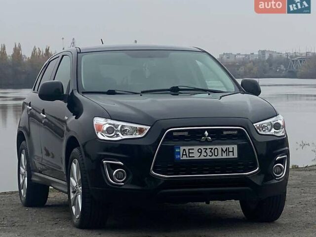 Чорний Міцубісі Аутлендер, об'ємом двигуна 2 л та пробігом 250 тис. км за 10800 $, фото 1 на Automoto.ua
