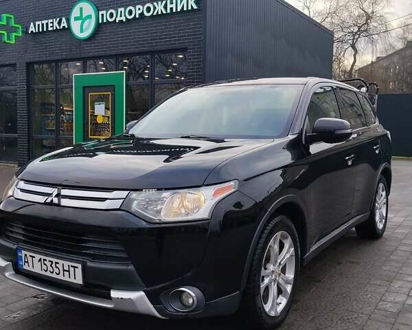Чорний Міцубісі Аутлендер, об'ємом двигуна 2.4 л та пробігом 224 тис. км за 12000 $, фото 9 на Automoto.ua