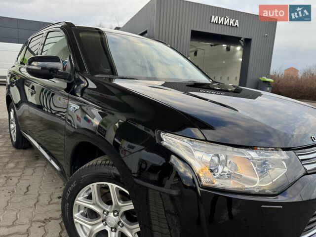 Чорний Міцубісі Аутлендер, об'ємом двигуна 2 л та пробігом 157 тис. км за 15299 $, фото 12 на Automoto.ua