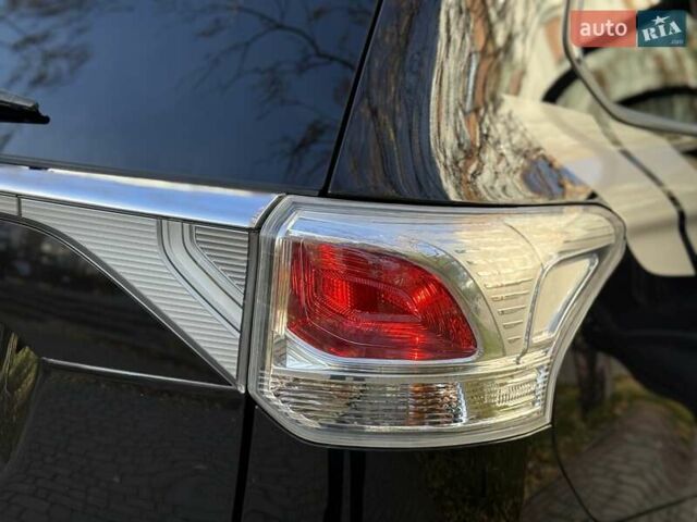 Черный Мицубиси Аутлендер, объемом двигателя 2.4 л и пробегом 270 тыс. км за 12500 $, фото 44 на Automoto.ua