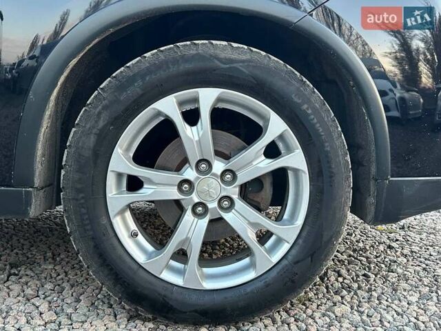 Чорний Міцубісі Аутлендер, об'ємом двигуна 2.4 л та пробігом 199 тис. км за 12800 $, фото 34 на Automoto.ua