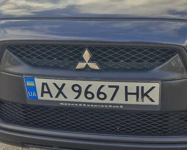 Чорний Міцубісі Аутлендер, об'ємом двигуна 2 л та пробігом 83 тис. км за 13500 $, фото 8 на Automoto.ua