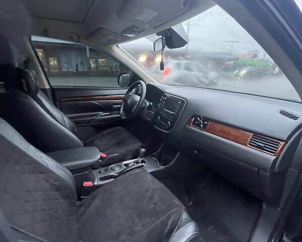 Черный Мицубиси Аутлендер, объемом двигателя 2.4 л и пробегом 168 тыс. км за 11800 $, фото 7 на Automoto.ua