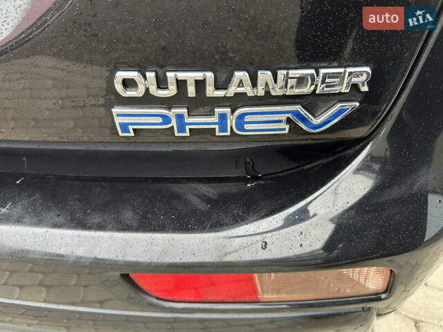 Черный Мицубиси Аутлендер, объемом двигателя 2 л и пробегом 223 тыс. км за 13400 $, фото 8 на Automoto.ua