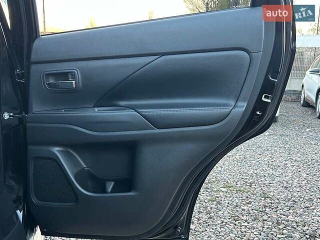 Чорний Міцубісі Аутлендер, об'ємом двигуна 2.4 л та пробігом 199 тис. км за 12800 $, фото 30 на Automoto.ua