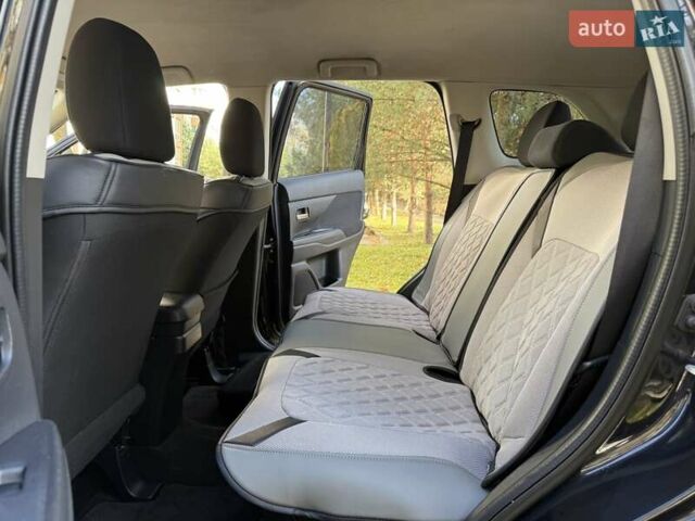 Черный Мицубиси Аутлендер, объемом двигателя 2.4 л и пробегом 270 тыс. км за 12500 $, фото 31 на Automoto.ua