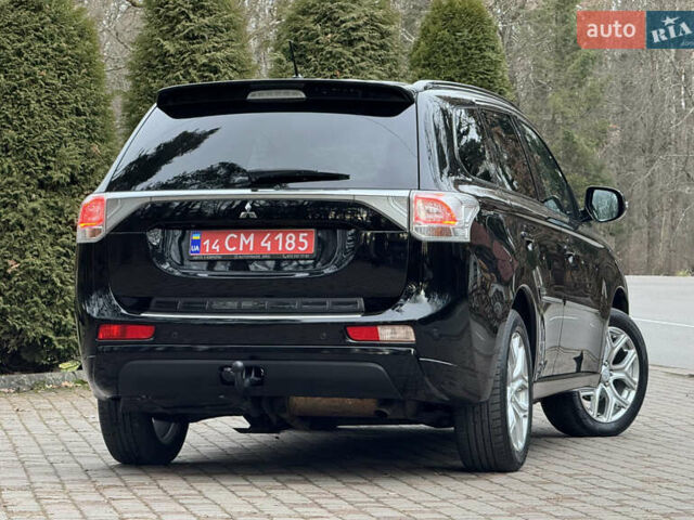 Черный Мицубиси Аутлендер, объемом двигателя 2 л и пробегом 173 тыс. км за 15299 $, фото 35 на Automoto.ua