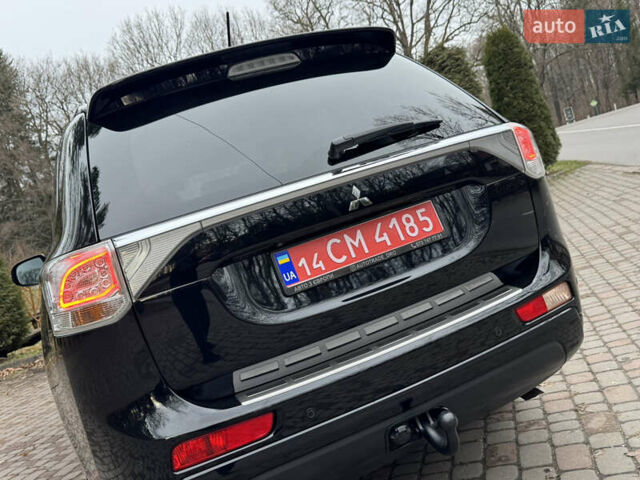Черный Мицубиси Аутлендер, объемом двигателя 2 л и пробегом 173 тыс. км за 15299 $, фото 58 на Automoto.ua