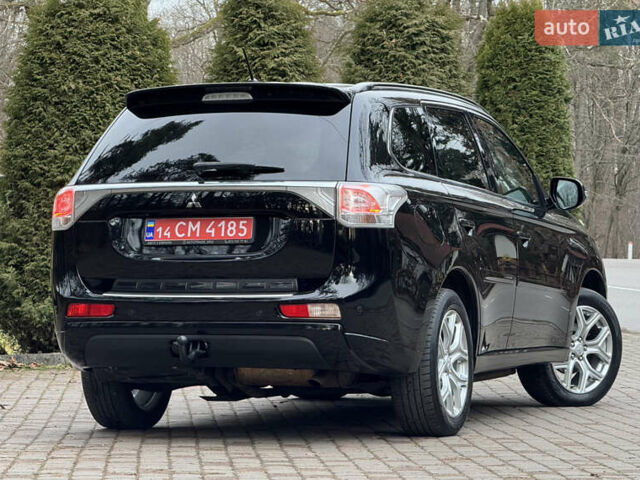Черный Мицубиси Аутлендер, объемом двигателя 2 л и пробегом 173 тыс. км за 15299 $, фото 34 на Automoto.ua