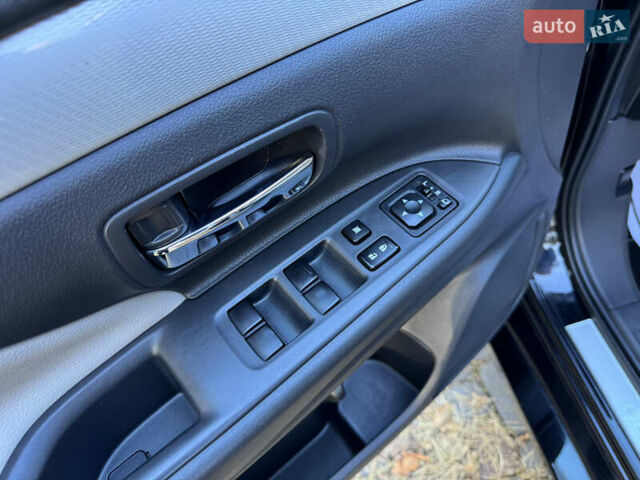 Чорний Міцубісі Аутлендер, об'ємом двигуна 2 л та пробігом 173 тис. км за 15299 $, фото 77 на Automoto.ua