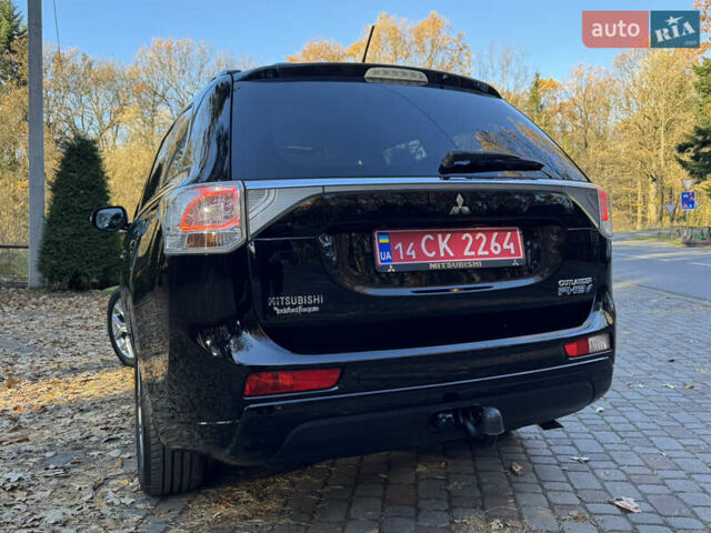 Чорний Міцубісі Аутлендер, об'ємом двигуна 2 л та пробігом 173 тис. км за 15299 $, фото 65 на Automoto.ua
