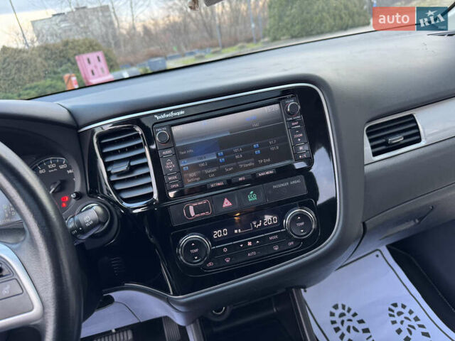 Чорний Міцубісі Аутлендер, об'ємом двигуна 2 л та пробігом 157 тис. км за 15299 $, фото 78 на Automoto.ua