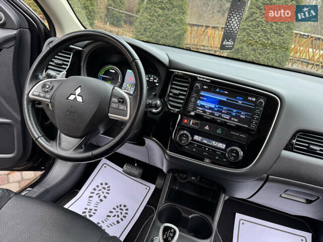 Черный Мицубиси Аутлендер, объемом двигателя 2 л и пробегом 173 тыс. км за 15299 $, фото 89 на Automoto.ua