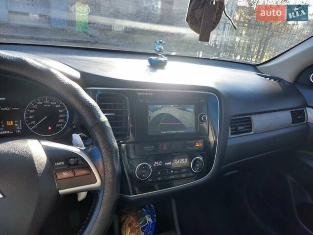 Черный Мицубиси Аутлендер, объемом двигателя 2.4 л и пробегом 183 тыс. км за 15000 $, фото 2 на Automoto.ua