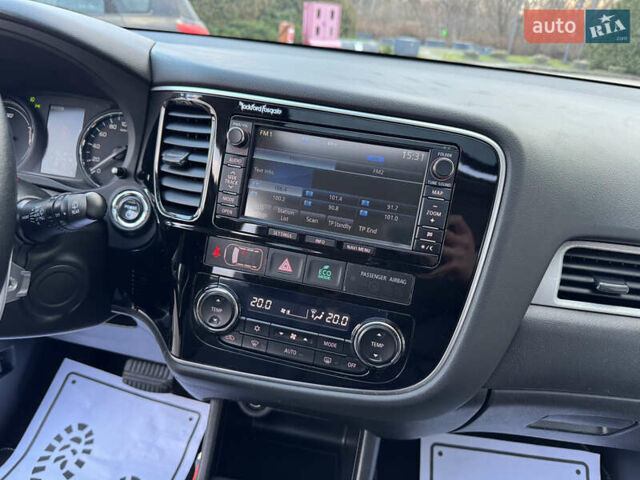 Чорний Міцубісі Аутлендер, об'ємом двигуна 2 л та пробігом 157 тис. км за 15299 $, фото 88 на Automoto.ua