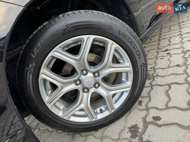 Чорний Міцубісі Аутлендер, об'ємом двигуна 2 л та пробігом 157 тис. км за 15299 $, фото 30 на Automoto.ua