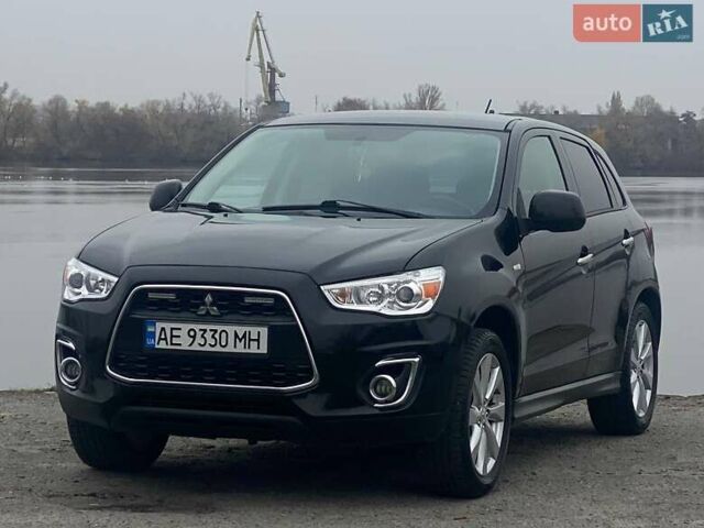 Чорний Міцубісі Аутлендер, об'ємом двигуна 2 л та пробігом 250 тис. км за 10800 $, фото 2 на Automoto.ua