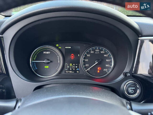 Чорний Міцубісі Аутлендер, об'ємом двигуна 2 л та пробігом 157 тис. км за 15299 $, фото 77 на Automoto.ua