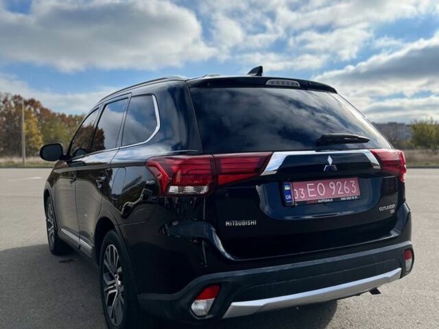 Черный Мицубиси Аутлендер, объемом двигателя 2.4 л и пробегом 91 тыс. км за 15500 $, фото 5 на Automoto.ua