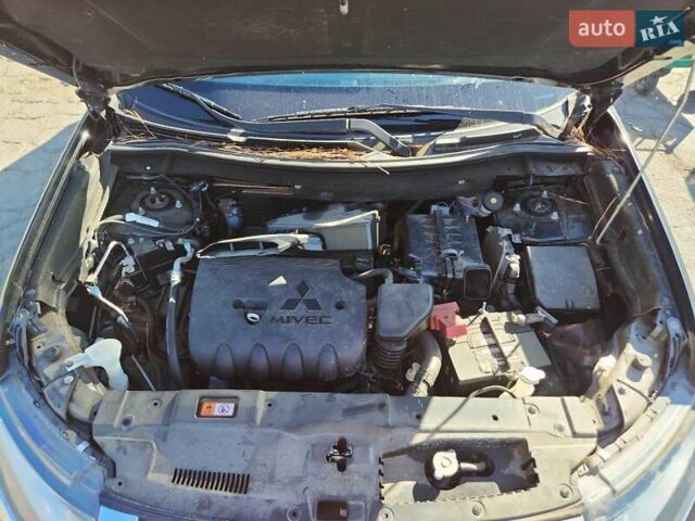 Чорний Міцубісі Аутлендер, об'ємом двигуна 2.36 л та пробігом 99 тис. км за 2100 $, фото 10 на Automoto.ua