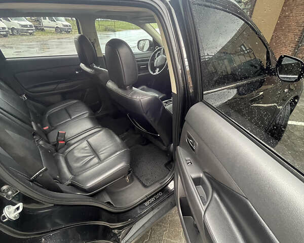 Черный Мицубиси Аутлендер, объемом двигателя 3 л и пробегом 257 тыс. км за 13699 $, фото 12 на Automoto.ua