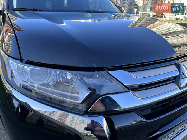 Черный Мицубиси Аутлендер, объемом двигателя 2.36 л и пробегом 150 тыс. км за 14900 $, фото 17 на Automoto.ua