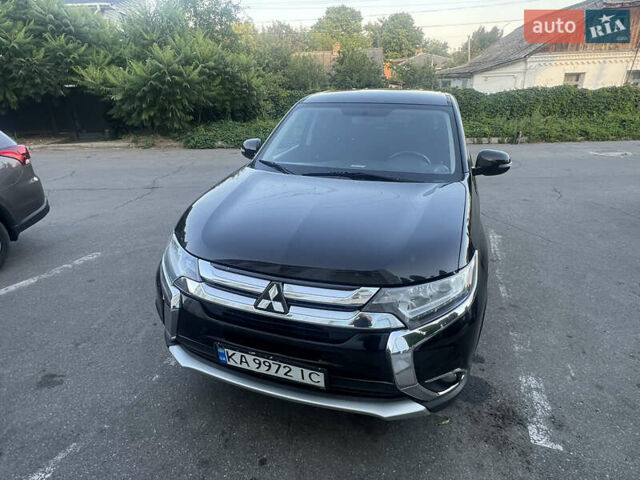 Чорний Міцубісі Аутлендер, об'ємом двигуна 2.35 л та пробігом 153 тис. км за 17800 $, фото 5 на Automoto.ua