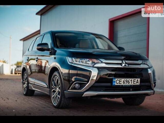 Чорний Міцубісі Аутлендер, об'ємом двигуна 2.36 л та пробігом 225 тис. км за 13699 $, фото 6 на Automoto.ua