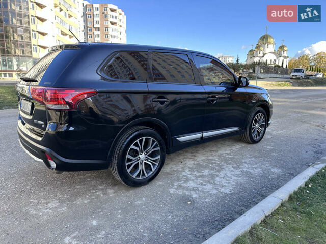 Черный Мицубиси Аутлендер, объемом двигателя 2.36 л и пробегом 150 тыс. км за 14900 $, фото 11 на Automoto.ua
