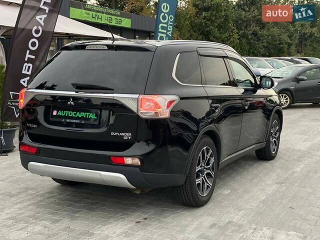 Черный Мицубиси Аутлендер, объемом двигателя 3 л и пробегом 146 тыс. км за 15990 $, фото 5 на Automoto.ua