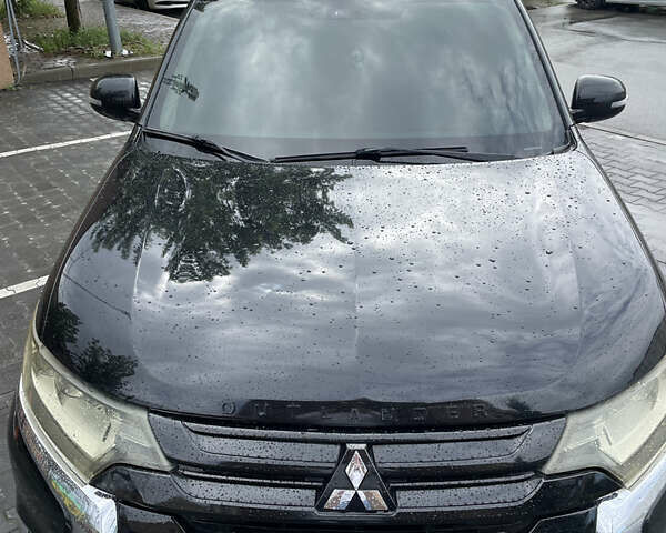 Черный Мицубиси Аутлендер, объемом двигателя 3 л и пробегом 257 тыс. км за 13699 $, фото 9 на Automoto.ua