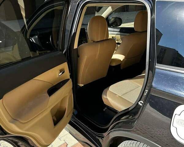 Чорний Міцубісі Аутлендер, об'ємом двигуна 2.36 л та пробігом 225 тис. км за 13699 $, фото 12 на Automoto.ua