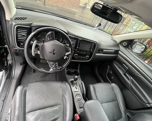 Черный Мицубиси Аутлендер, объемом двигателя 3 л и пробегом 257 тыс. км за 13699 $, фото 23 на Automoto.ua