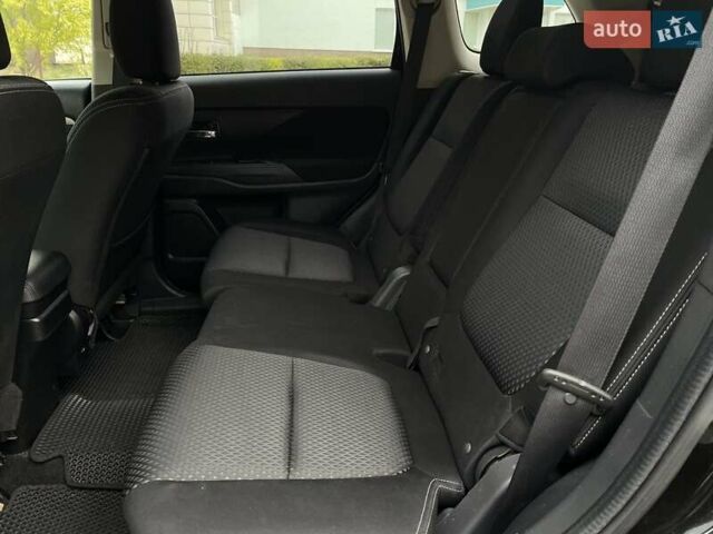 Черный Мицубиси Аутлендер, объемом двигателя 2.36 л и пробегом 167 тыс. км за 13500 $, фото 20 на Automoto.ua