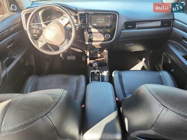 Чорний Міцубісі Аутлендер, об'ємом двигуна 2.36 л та пробігом 99 тис. км за 2100 $, фото 7 на Automoto.ua