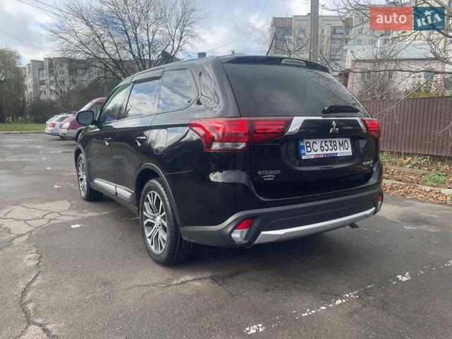 Чорний Міцубісі Аутлендер, об'ємом двигуна 2.36 л та пробігом 121 тис. км за 14700 $, фото 3 на Automoto.ua