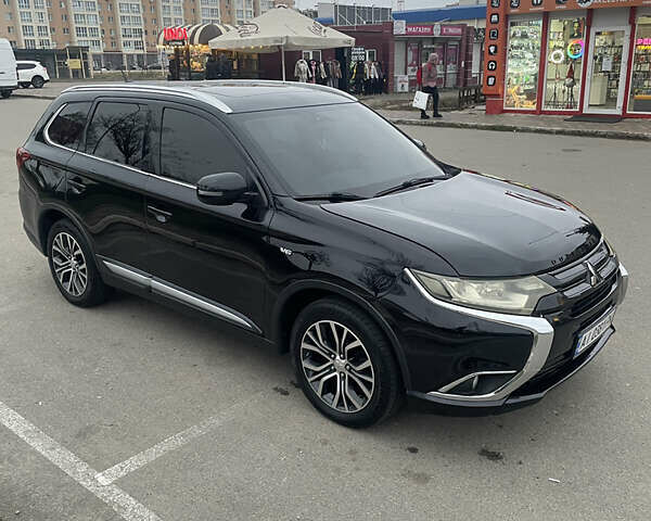 Черный Мицубиси Аутлендер, объемом двигателя 3 л и пробегом 260 тыс. км за 13799 $, фото 7 на Automoto.ua