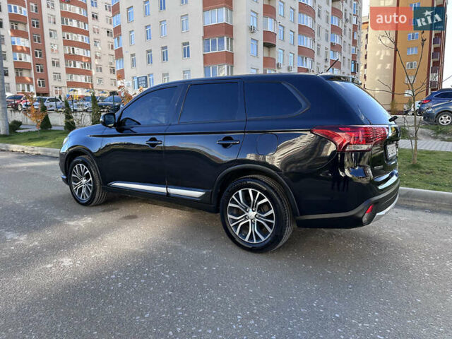 Черный Мицубиси Аутлендер, объемом двигателя 2.36 л и пробегом 150 тыс. км за 14900 $, фото 7 на Automoto.ua