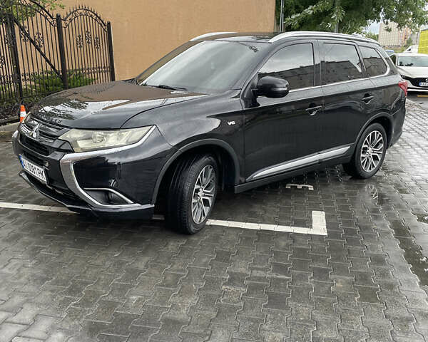 Черный Мицубиси Аутлендер, объемом двигателя 3 л и пробегом 257 тыс. км за 13699 $, фото 5 на Automoto.ua
