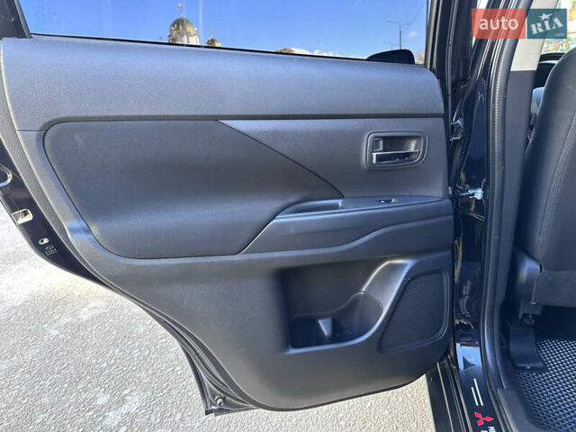 Черный Мицубиси Аутлендер, объемом двигателя 2.36 л и пробегом 150 тыс. км за 14900 $, фото 25 на Automoto.ua