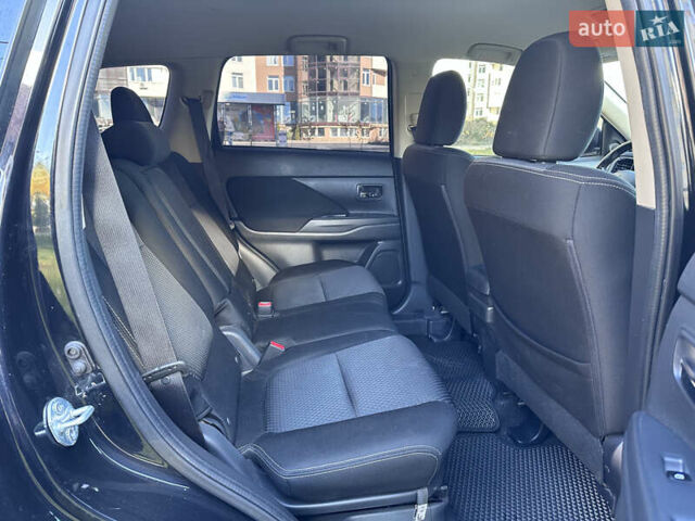 Черный Мицубиси Аутлендер, объемом двигателя 2.36 л и пробегом 150 тыс. км за 14900 $, фото 41 на Automoto.ua