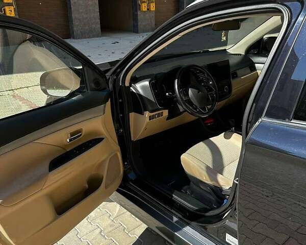 Чорний Міцубісі Аутлендер, об'ємом двигуна 2.36 л та пробігом 225 тис. км за 13699 $, фото 11 на Automoto.ua