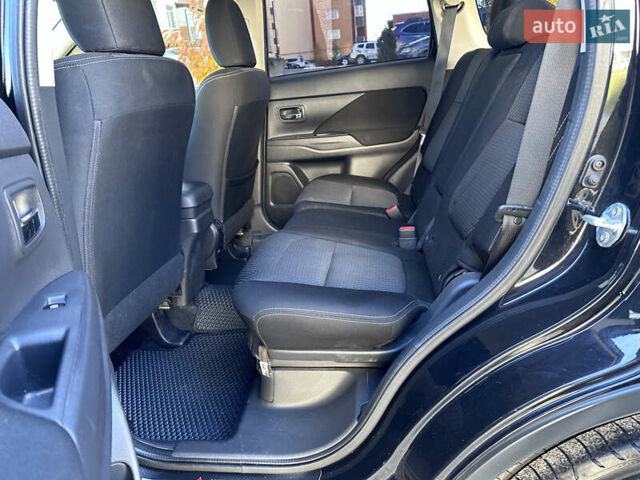 Черный Мицубиси Аутлендер, объемом двигателя 2.36 л и пробегом 150 тыс. км за 14900 $, фото 26 на Automoto.ua