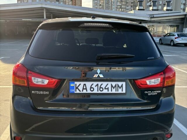 Черный Мицубиси Аутлендер, объемом двигателя 2 л и пробегом 105 тыс. км за 9999 $, фото 3 на Automoto.ua