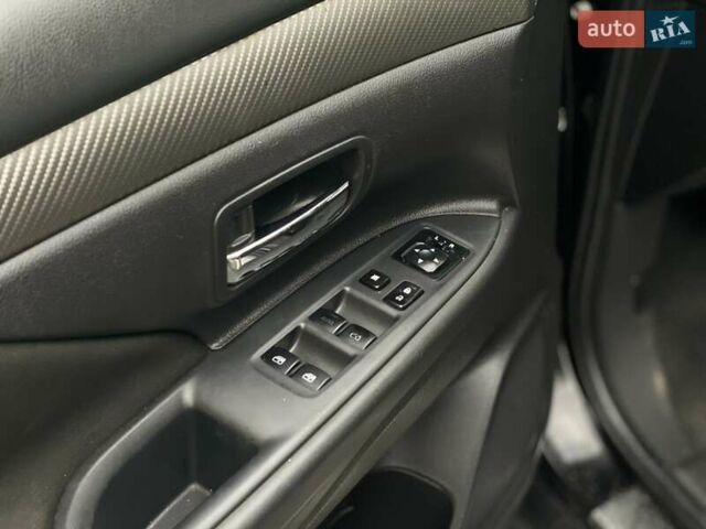 Черный Мицубиси Аутлендер, объемом двигателя 2.36 л и пробегом 167 тыс. км за 13500 $, фото 11 на Automoto.ua