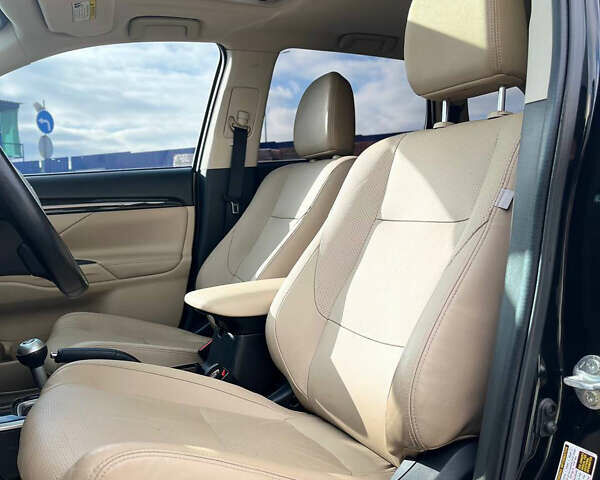 Черный Мицубиси Аутлендер, объемом двигателя 2.36 л и пробегом 91 тыс. км за 15500 $, фото 7 на Automoto.ua