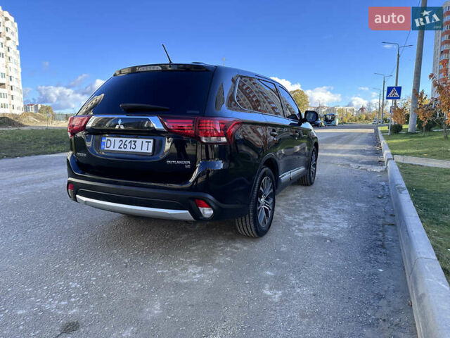 Черный Мицубиси Аутлендер, объемом двигателя 2.36 л и пробегом 150 тыс. км за 14900 $, фото 9 на Automoto.ua