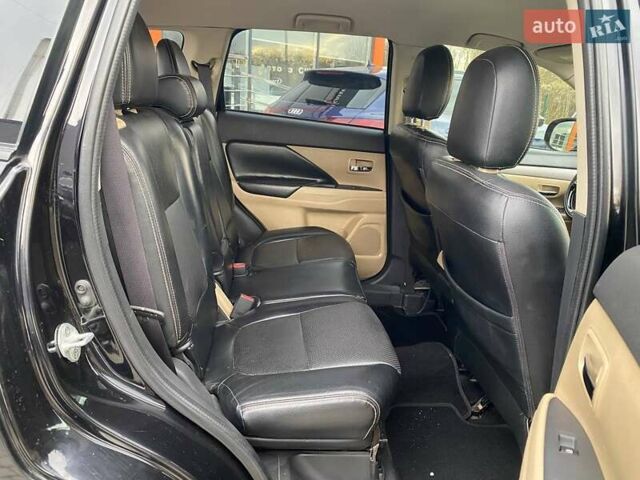 Черный Мицубиси Аутлендер, объемом двигателя 2.36 л и пробегом 143 тыс. км за 12900 $, фото 21 на Automoto.ua