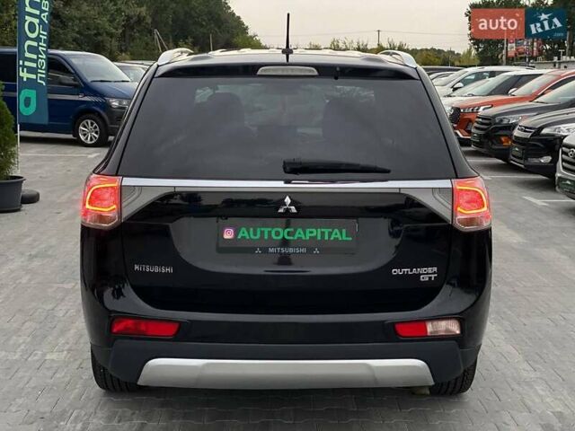 Черный Мицубиси Аутлендер, объемом двигателя 3 л и пробегом 146 тыс. км за 15990 $, фото 6 на Automoto.ua