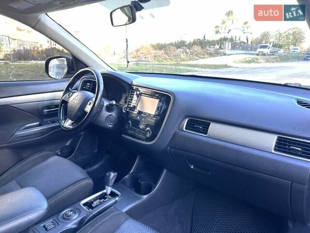 Черный Мицубиси Аутлендер, объемом двигателя 2.36 л и пробегом 150 тыс. км за 14900 $, фото 46 на Automoto.ua